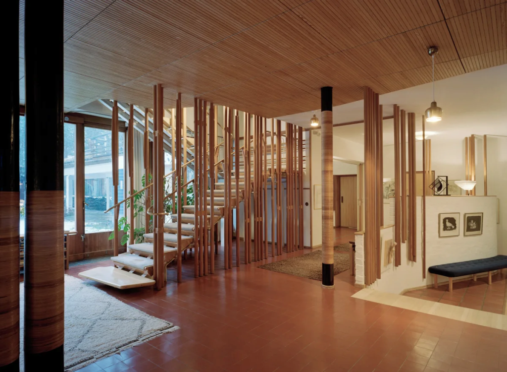 Interior Villa Mairea, wood rattan columns filtering light