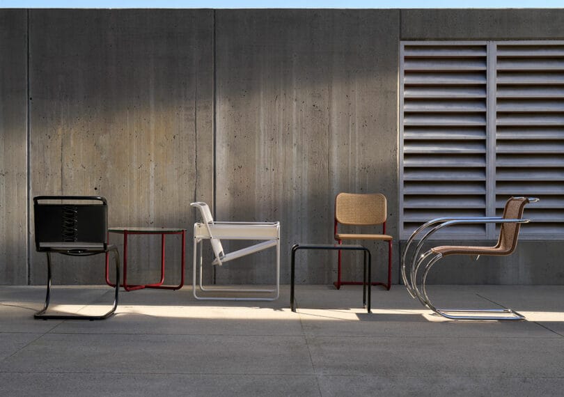 Composition of iconic Bauhaus furniture: Wassily, Cesca chairs and Laccio table in a modern interior