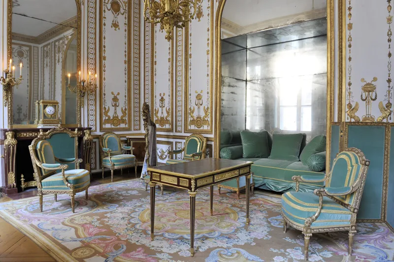 Marie-Antoinette's Gilded Cabinet at Petit Trianon, refined example of Louis XVI style with carved woodwork and gilding.
