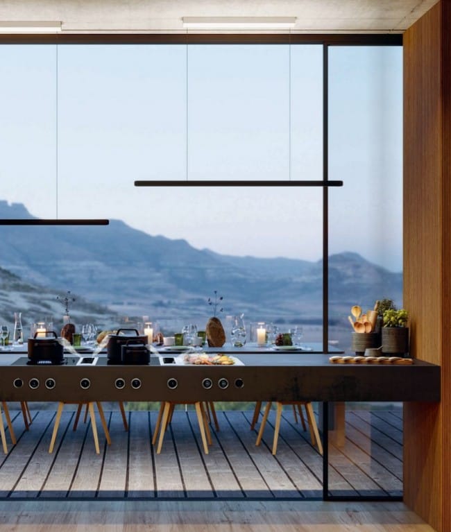 BORA Professional cooktop with integrated hood in a designer kitchen open to nature.