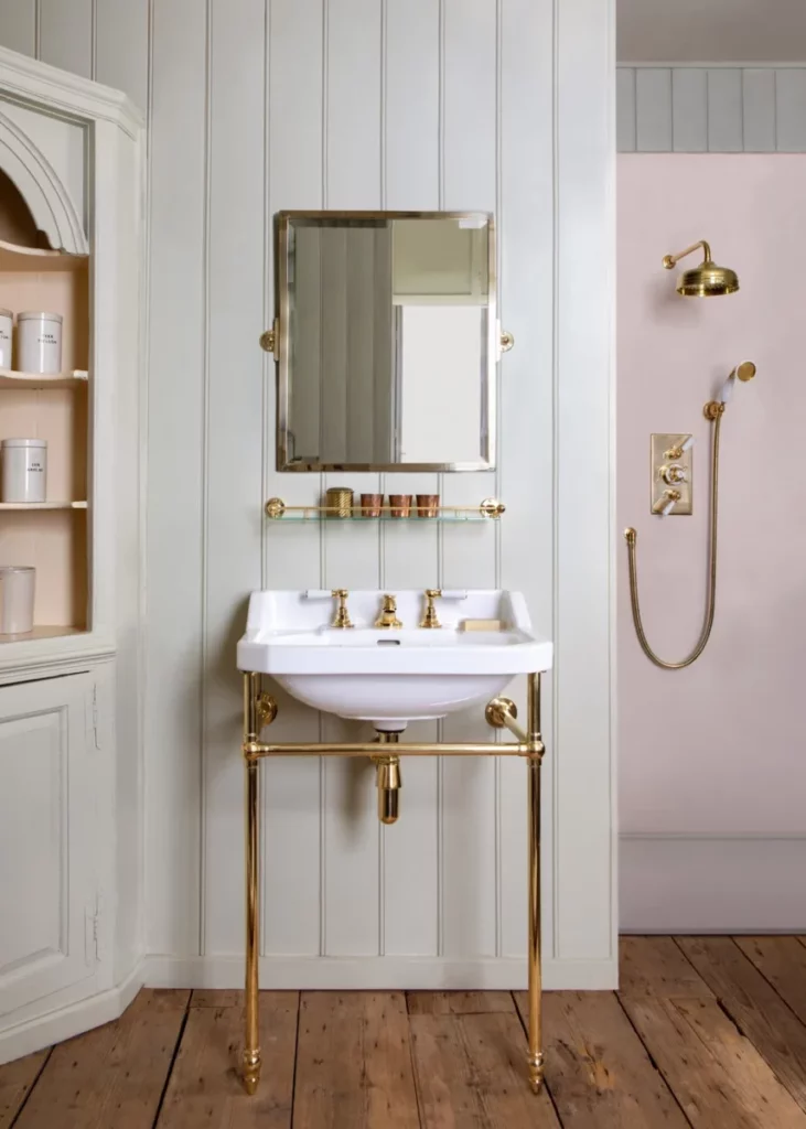 lefroy brooks washbasin and plumbing in polished brass, the old apothecary collection in a refined classic bathroom.