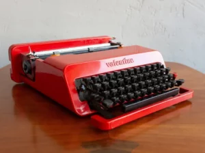 Valentine typewriter (Olivetti, 1969) — red typewriter signed by Ettore Sottsass, symbol of Italian pop and democratic design.