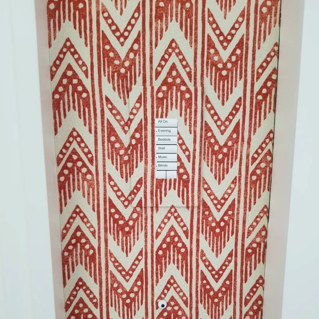 Detail of fabric walling installation around multiple sockets