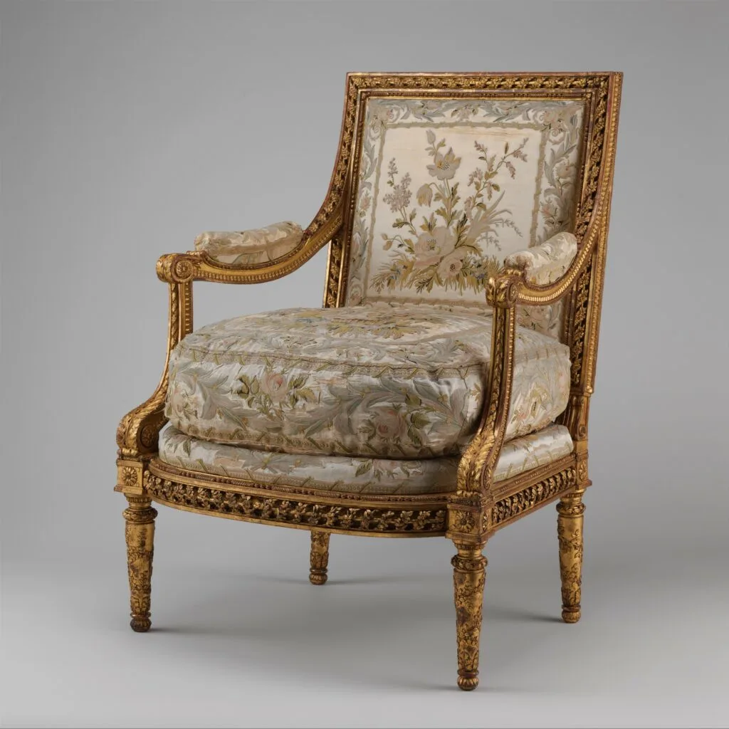 Louis XVI à la reine armchair in carved and gilded wood, fluted legs with connection blocks, attributed to Georges Jacob, circa 1780, Metropolitan Museum of Art