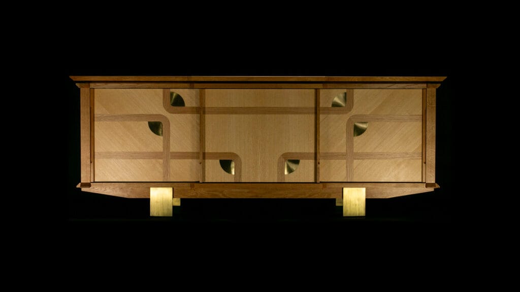 Hélios solid wood furniture designed by cabinetmaker Adrien des Rues, contemporary artisanal furniture piece integrating geometric patterns and luminous elements, high-end design.